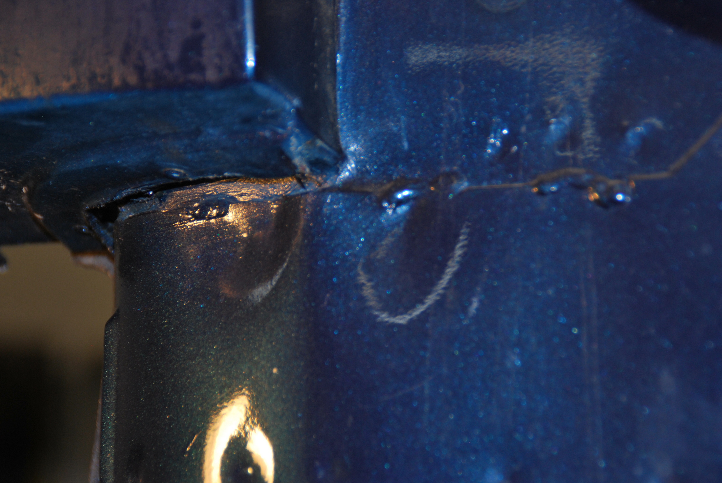 Blech unter Backe hinten links