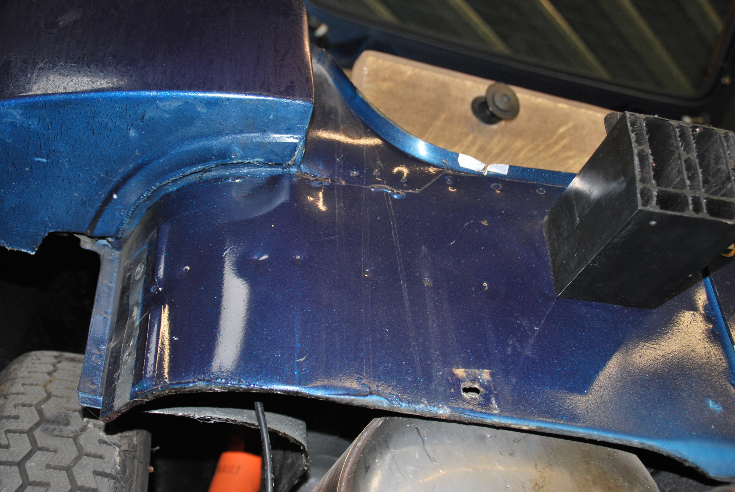 Blech unter Backe hinten links